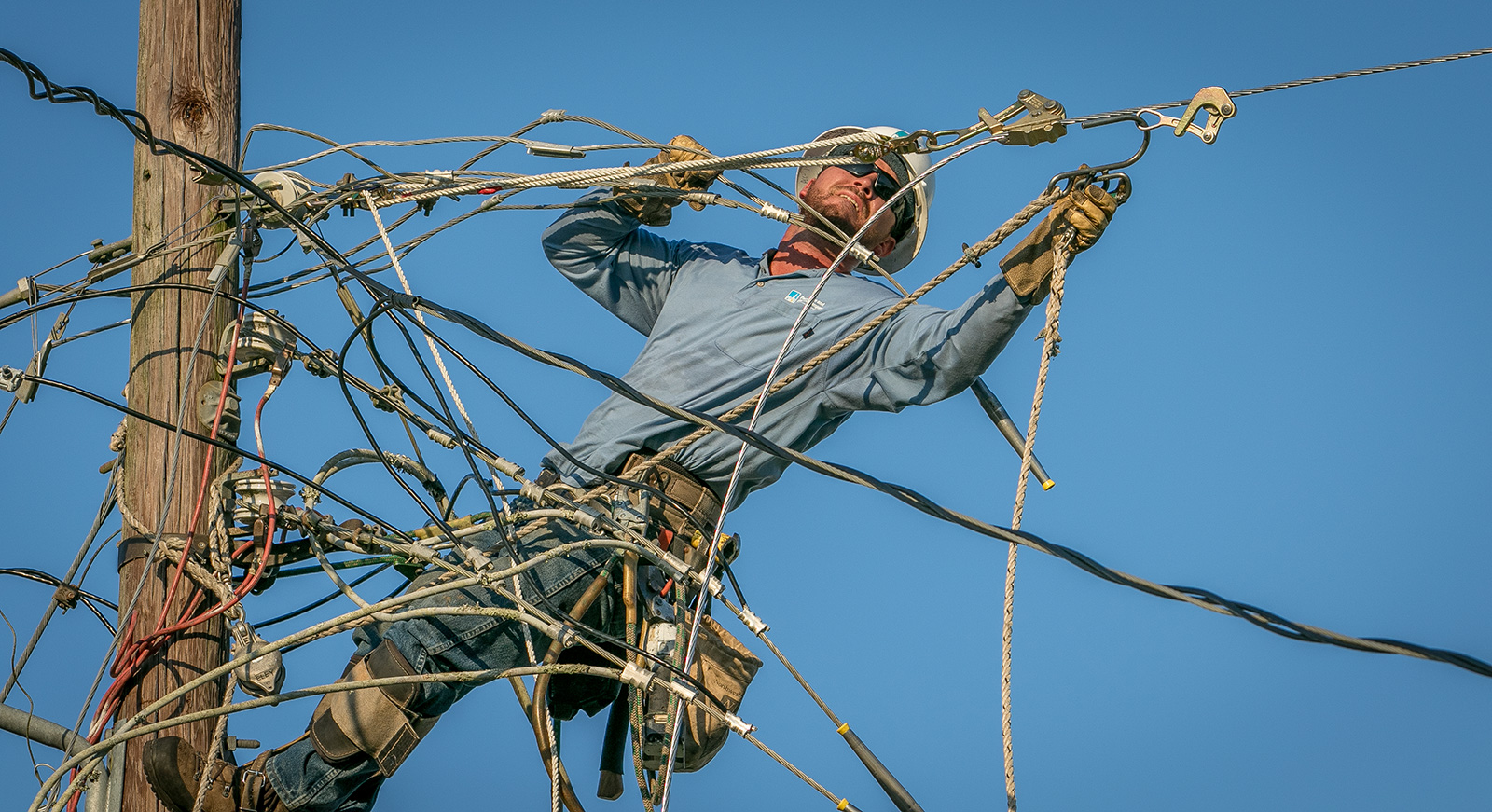 Lineworker on pole