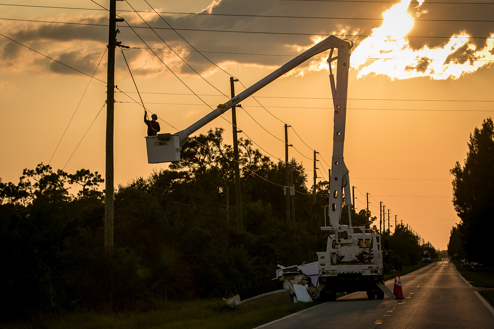 Bucket truck at sunset